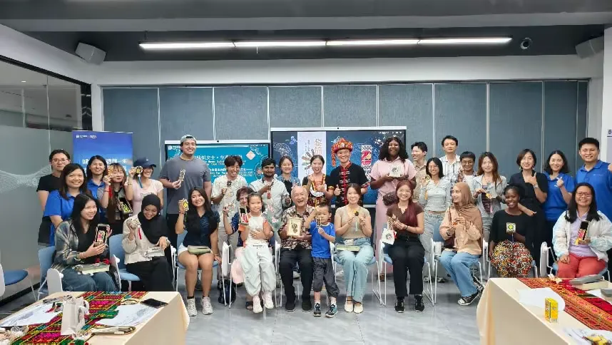 锦线织安全·非遗连世界｜在琼外籍人士金融与税务科普暨黎锦文化体验活动成功举办